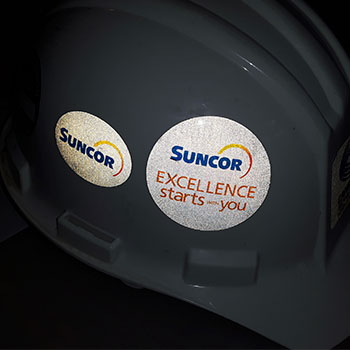 Safety orientation and logo stickers for hard-hat and helmets custom printed in Toronto Canada